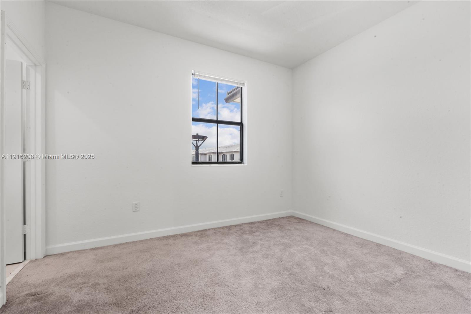 28637 Southwest 132nd Court Homestead, FL 33033 - Photo 34 of 45 an empty room with a window