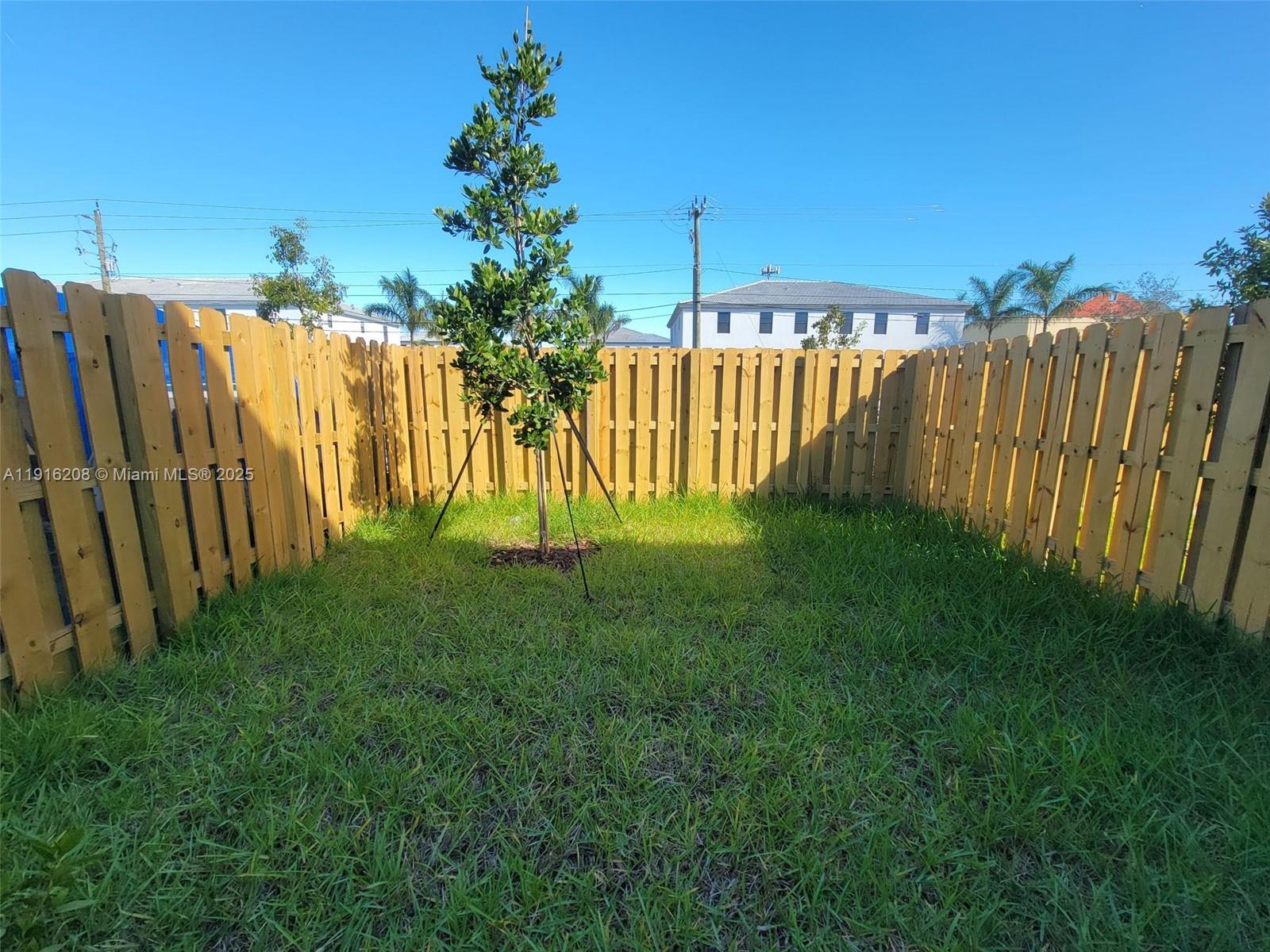 28637 Southwest 132nd Court Homestead, FL 33033 - Photo 37 of 45 a view of a yard with a house