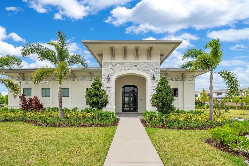 28637 Southwest 132nd Court Homestead, FL 33033 - Photo 44 of 45 a front view of a house with garden