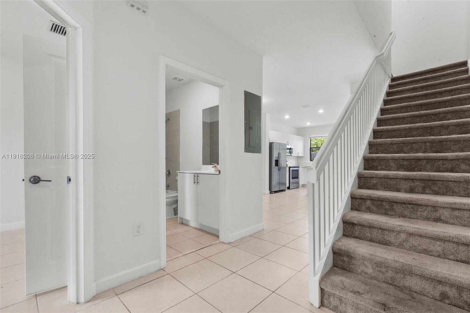 28637 Southwest 132nd Court Homestead, FL 33033 - Photo 8 of 45 a view of entryway with furniture and wooden floor