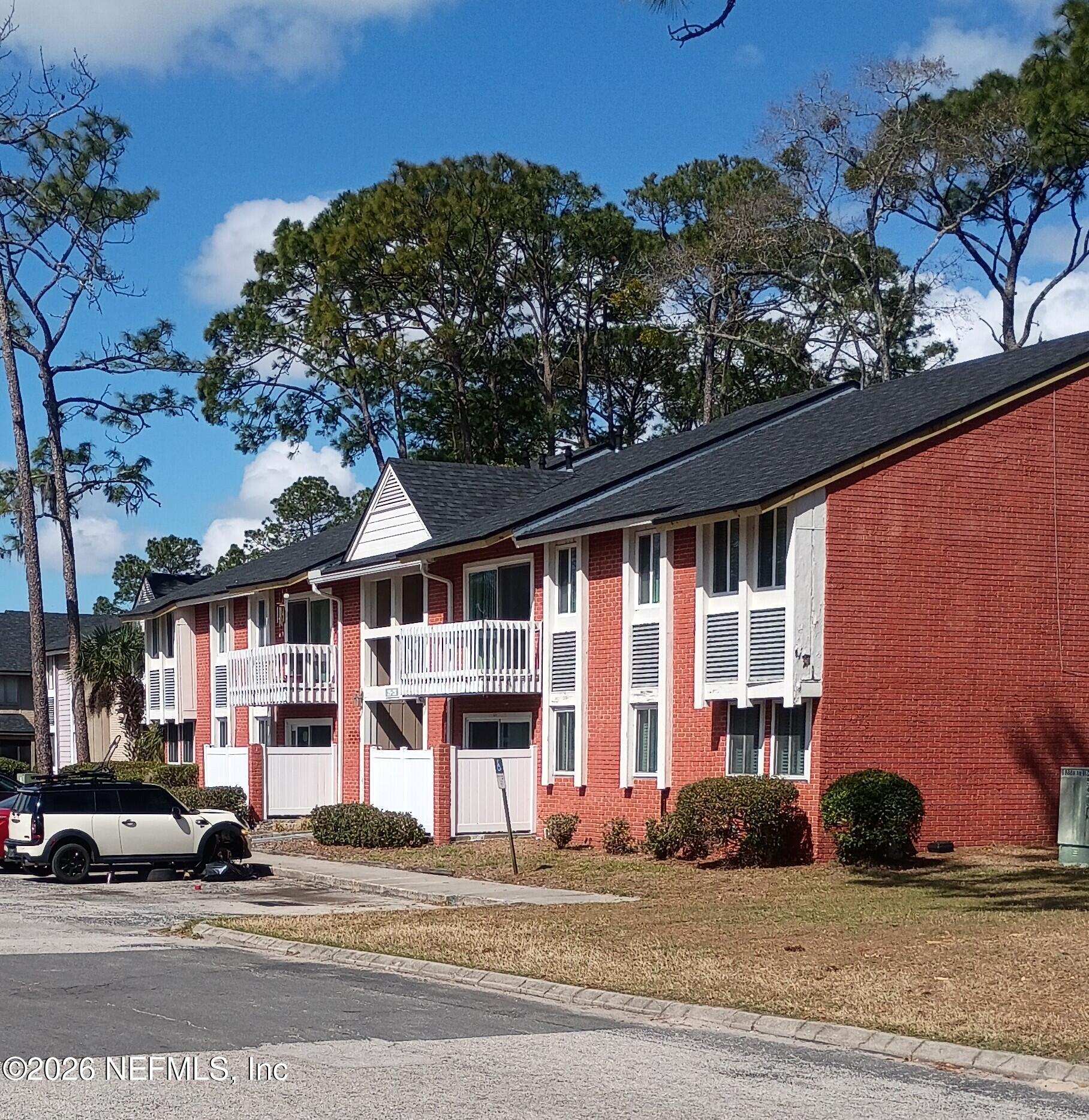 front view of a building with a street