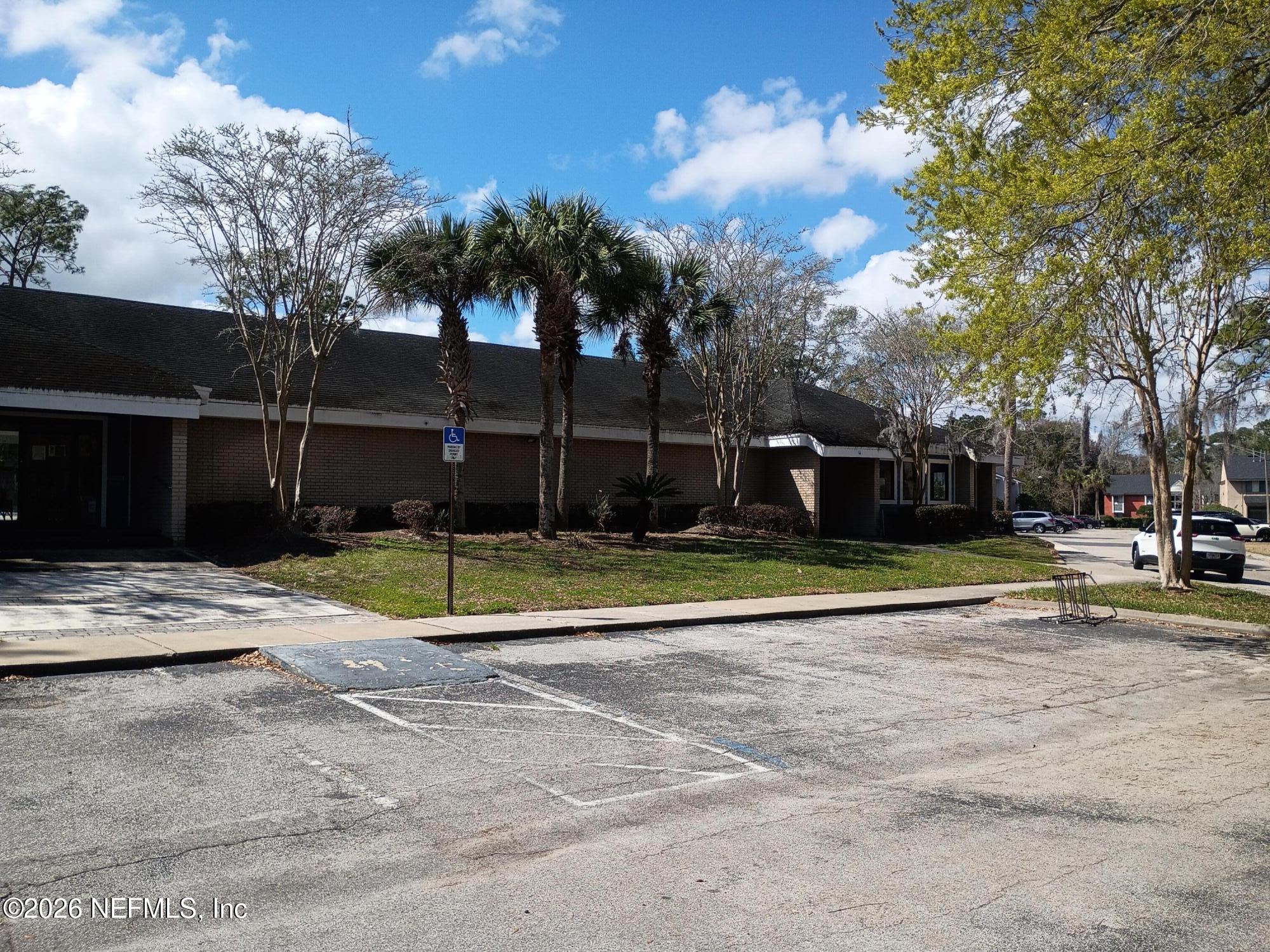 8880 Old Kings Road South, Unit 71 Jacksonville, FL 32257 - Photo 8 of 10 a view of a playground with basketball court