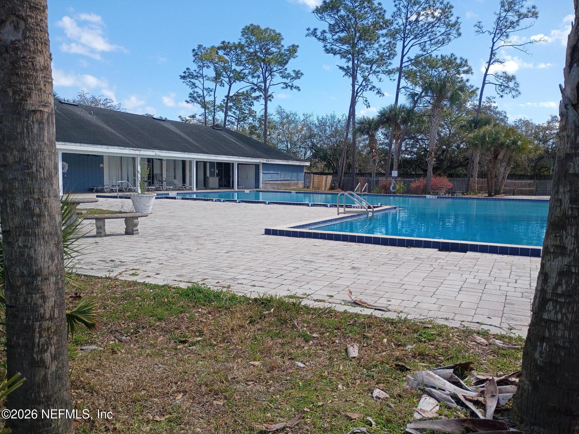 8880 Old Kings Road South, Unit 71 Jacksonville, FL 32257 - Photo 9 of 10 a view of a house with a yard