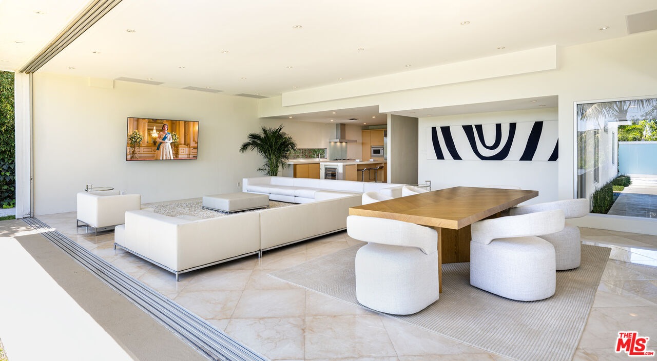1466 Bel Air Road Los Angeles, CA 90077 - Photo 6 of 35 a living room with furniture and a window
