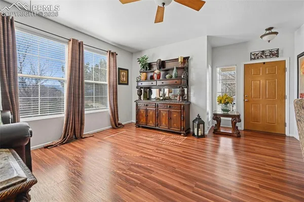 a view of livingroom with furniture and workspace