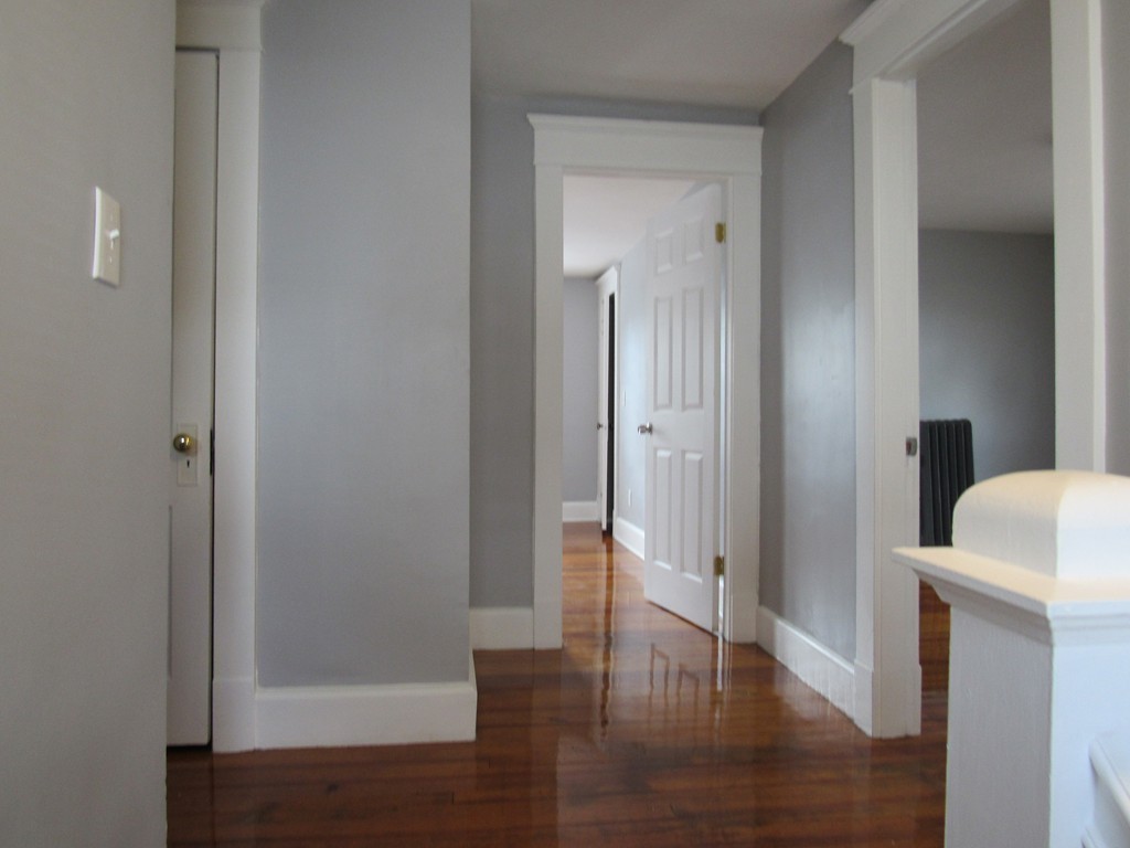 55 Rimmon Avenue Springfield, MA 01107 - Photo 11 of 17 a view of an empty room with wooden floor