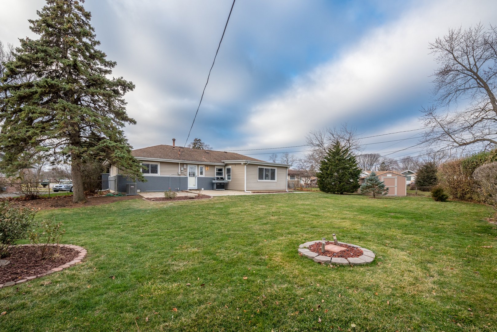 560 Lincoln Drive Hoffman Estates, IL 60169 - Photo 32 of 38 a view of a house with a big yard