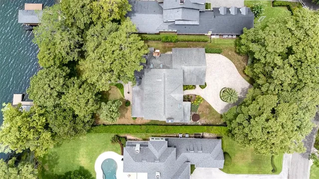 an aerial view of a house with garden space sitting space
