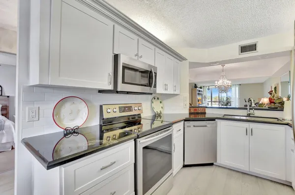 $220,000 | 23305 Barwood Lane North, Unit 303, Boca Raton, FL 33428