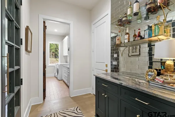 a room with gym equipment and a flat screen tv