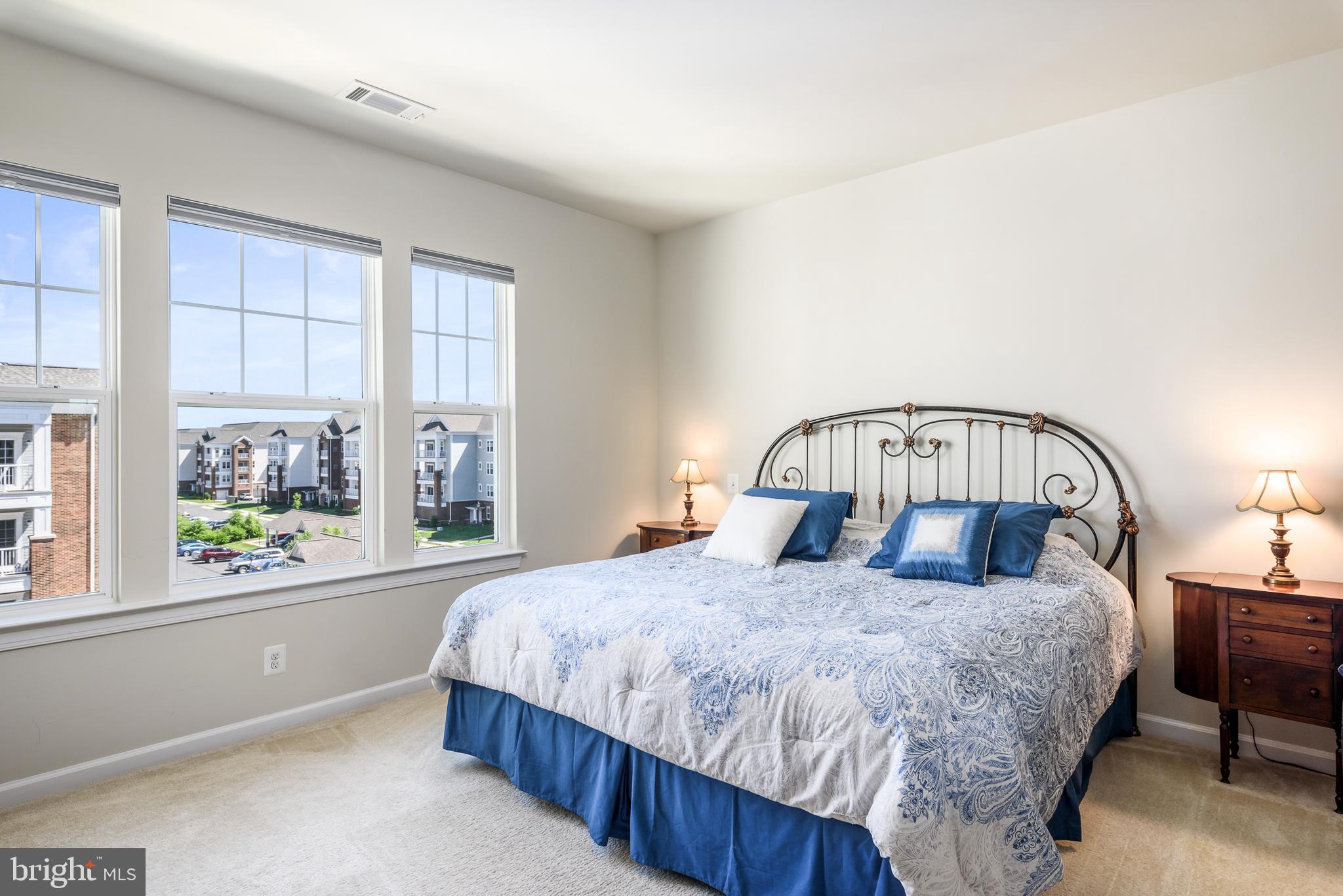 20650 Hope Spring Terrace, Unit 405 Ashburn, VA 20147 - Photo 18 of 34 Master Bedroom