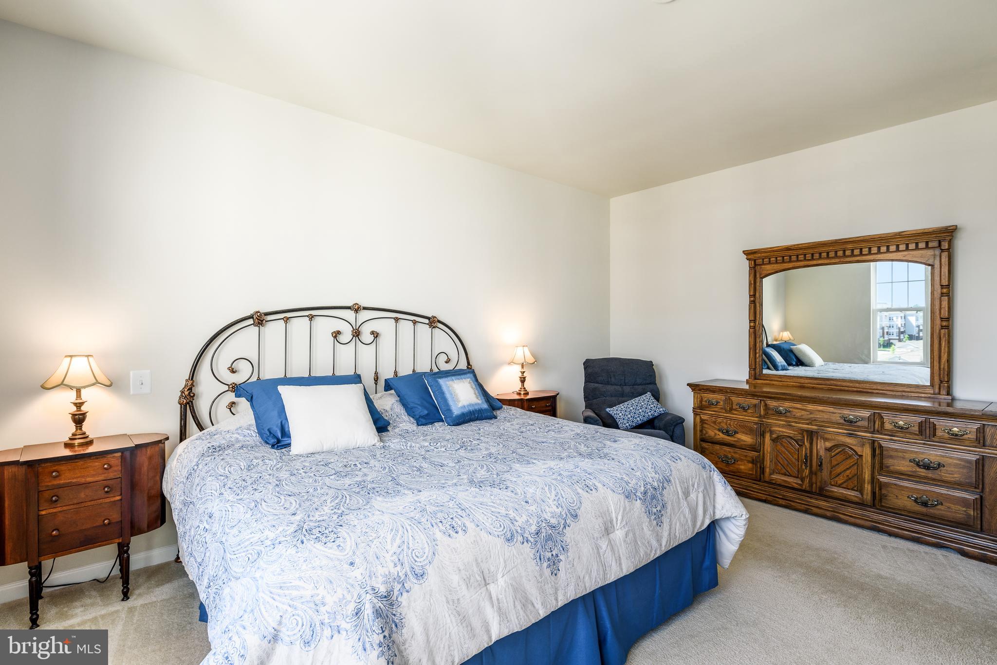 20650 Hope Spring Terrace, Unit 405 Ashburn, VA 20147 - Photo 19 of 34 Master Bedroom