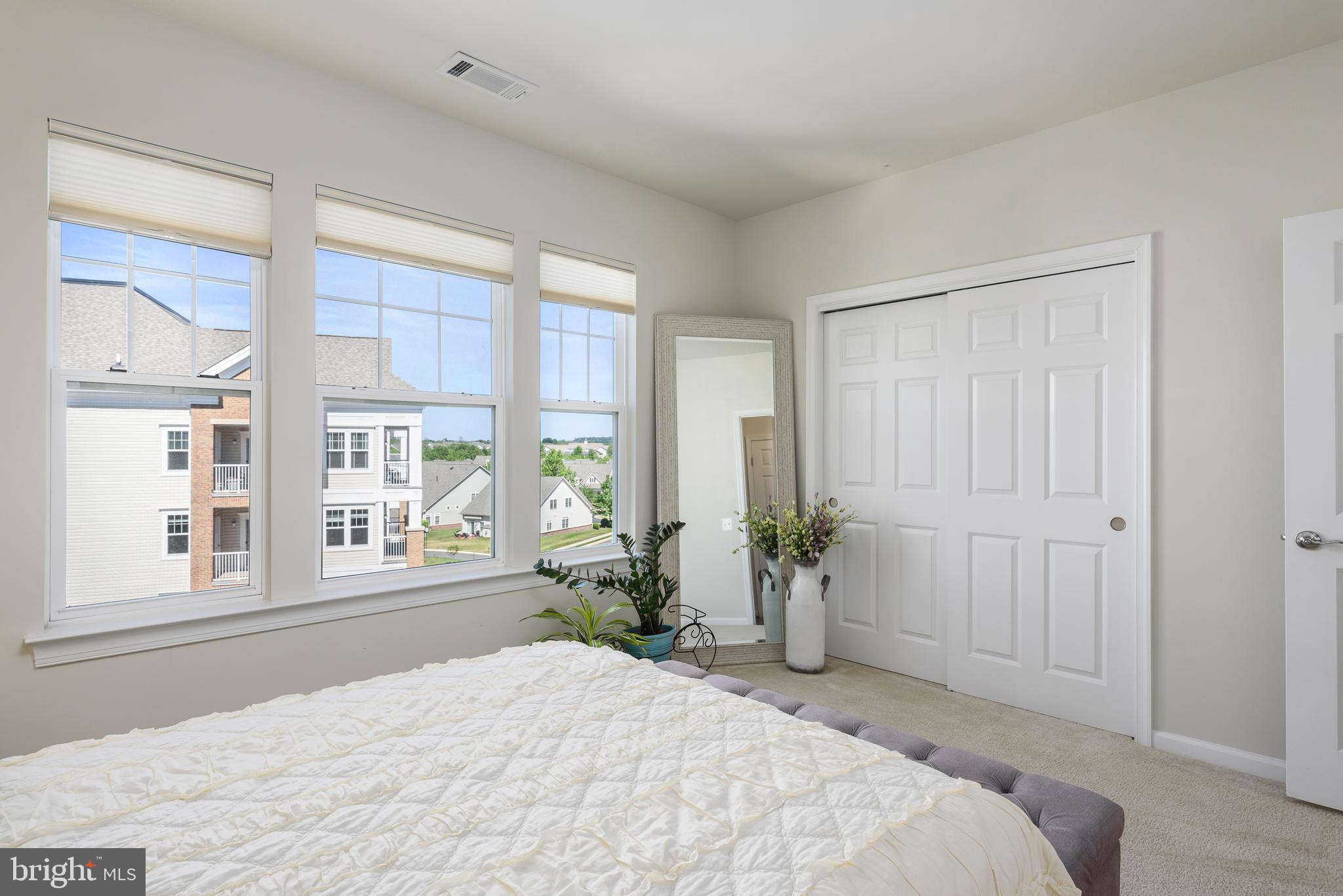 20650 Hope Spring Terrace, Unit 405 Ashburn, VA 20147 - Photo 25 of 34 Bedroom