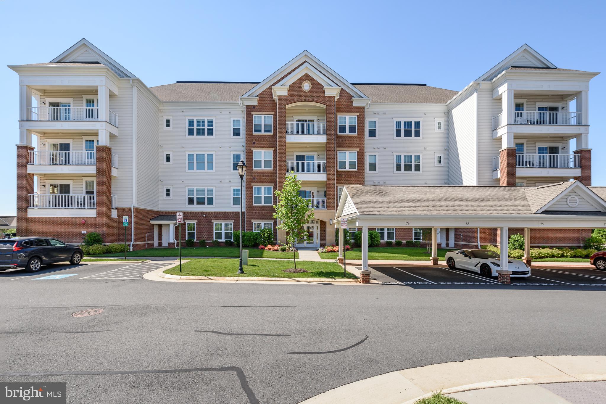 20650 Hope Spring Terrace, Unit 405 Ashburn, VA 20147 - Photo 28 of 34 Building and parking area