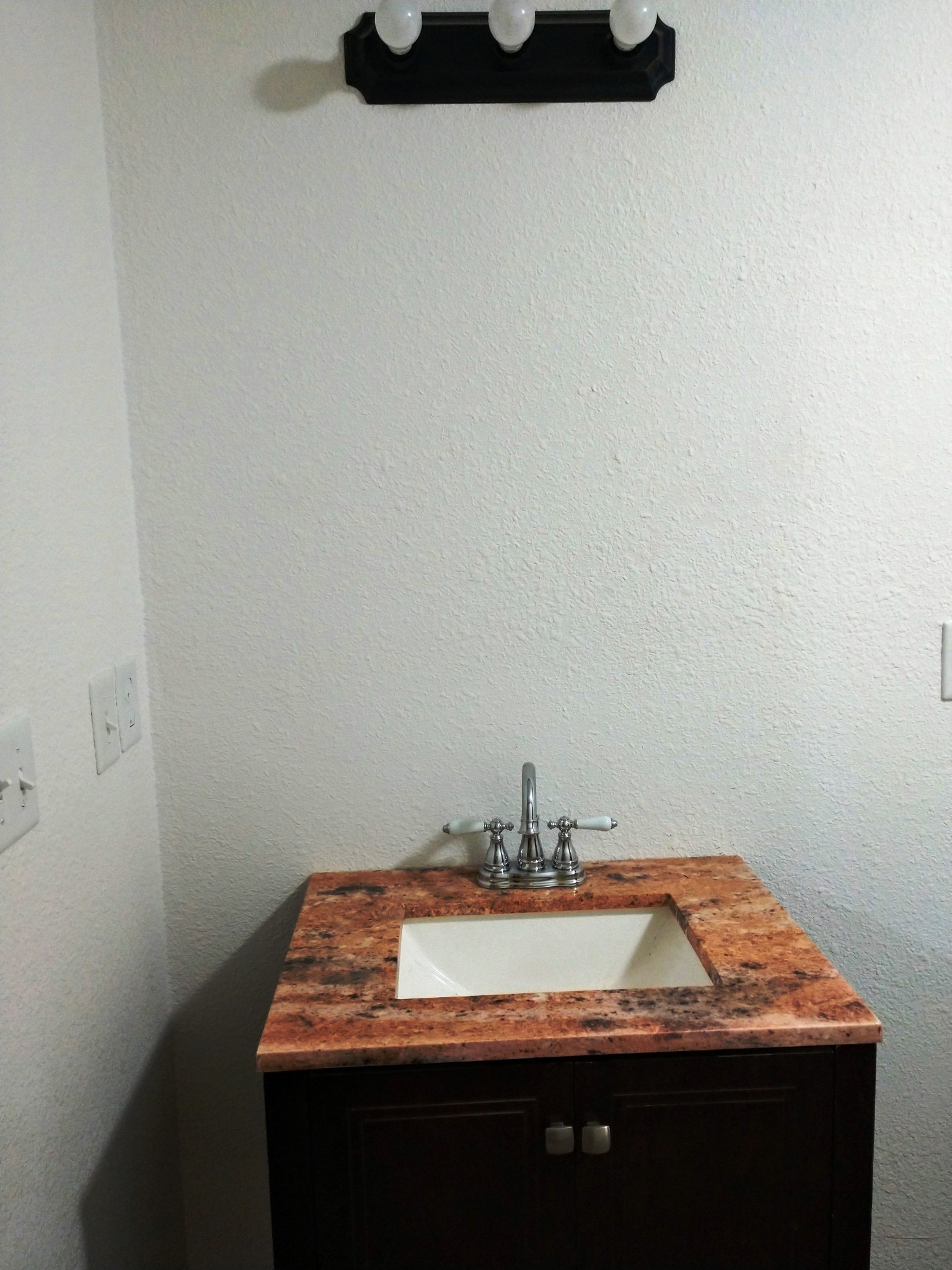 935 Poplar Flatt Road Silver Point, TN 38582 - Photo 11 of 33 a bathroom with a granite countertop sink and a mirror