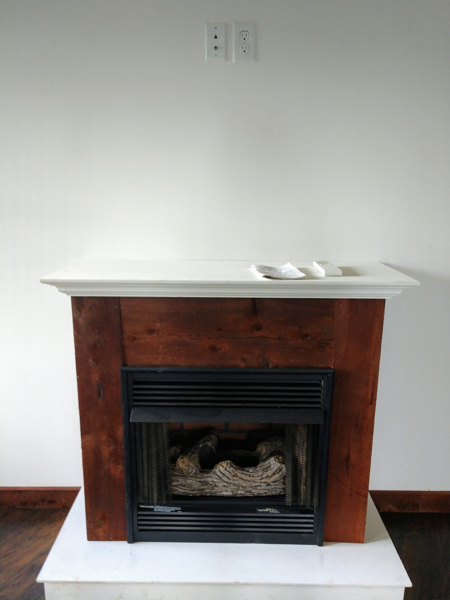 935 Poplar Flatt Road Silver Point, TN 38582 - Photo 25 of 33 a fireplace with a clock on top of it