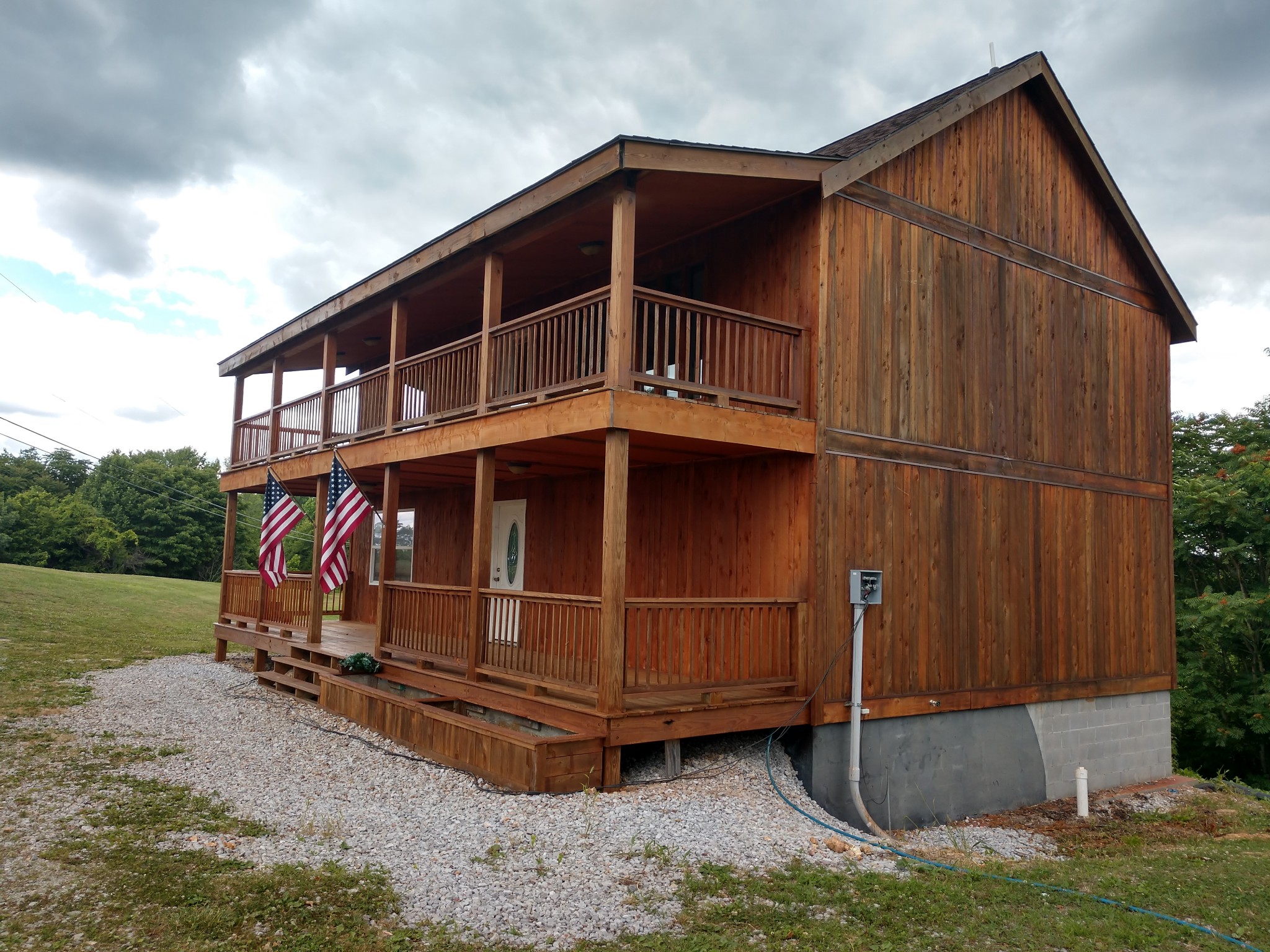 935 Poplar Flatt Road Silver Point, TN 38582 - Photo 31 of 33 a view of a small house with wooden fence
