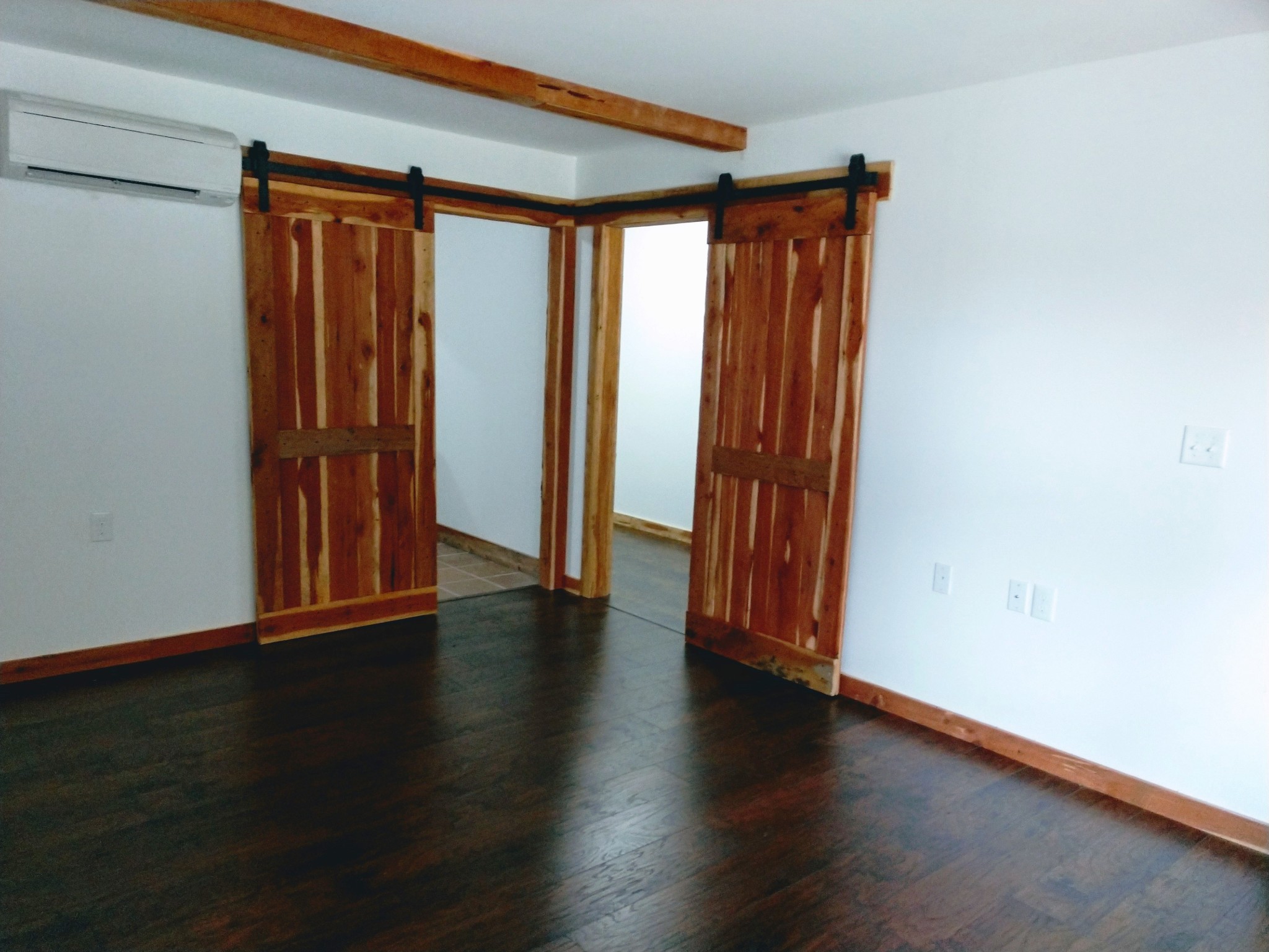 935 Poplar Flatt Road Silver Point, TN 38582 - Photo 4 of 33 an empty room with wooden floor and closet