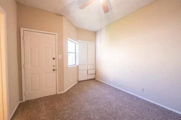 an empty room with a natural light