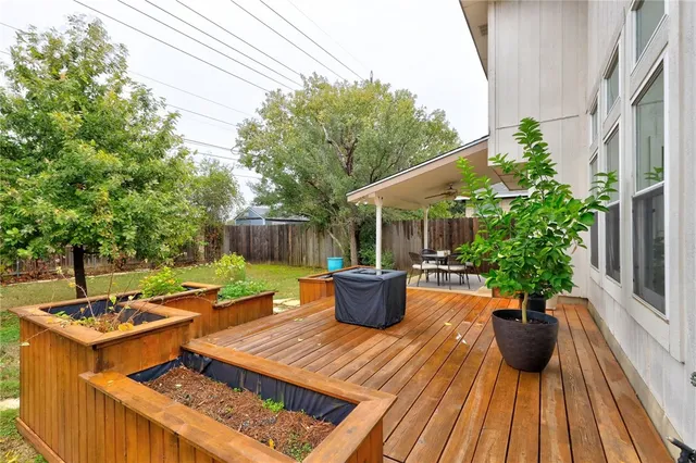 a view of a backyard with sitting area