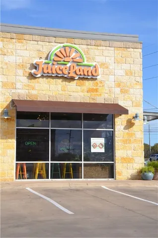 a view of a building with a patio