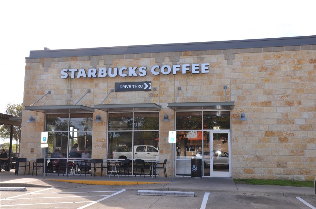 7908 Portland Trail Austin, TX 78729 - Photo 31 of 35 a view of a building with a patio