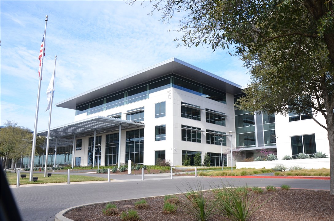 7908 Portland Trail Austin, TX 78729 - Photo 34 of 35 a view of a building with a garden