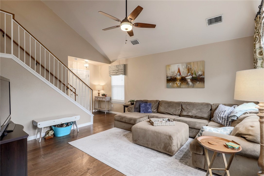 7908 Portland Trail Austin, TX 78729 - Photo 4 of 35 a living room with furniture and a view of bedroom