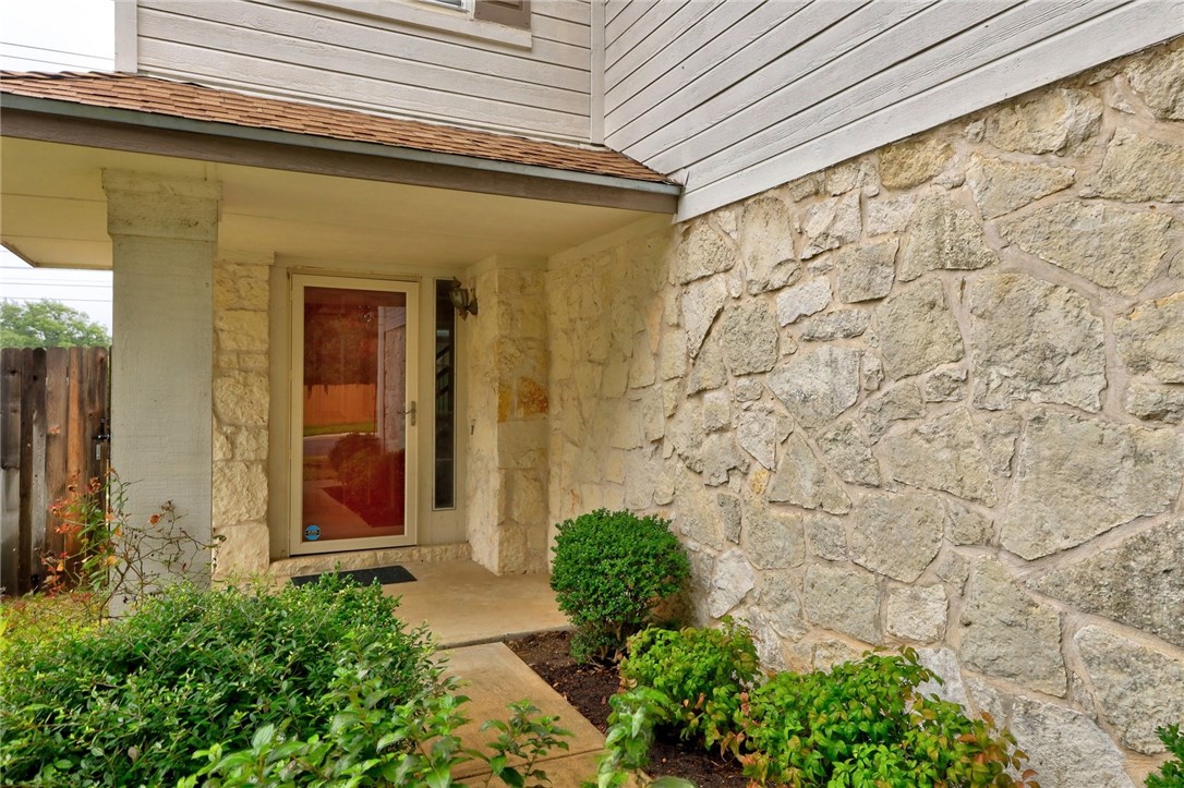 7908 Portland Trail Austin, TX 78729 - Photo 7 of 35 a view of front door of house