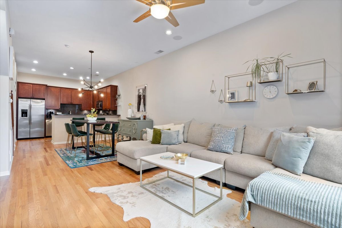926 North Crosby Street Chicago, IL 60610 - Photo 2 of 19 a living room with furniture kitchen view and a chandelier