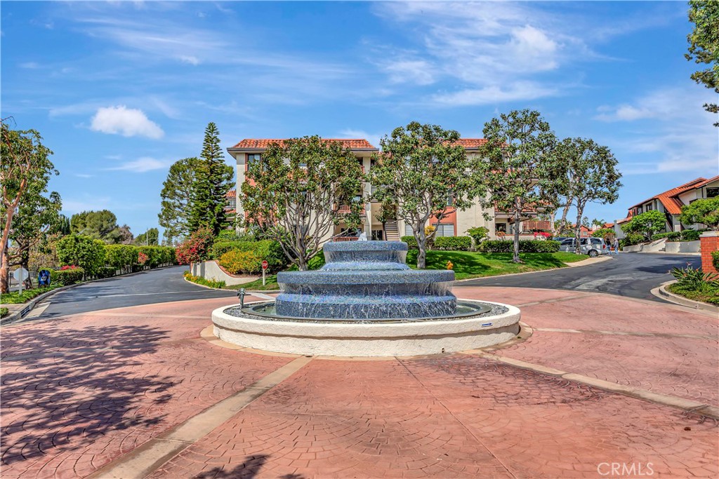 6225 Riviera Circle Long Beach, CA 90815 - Photo 3 of 51 THIS LOVELY TIERED FOUNTAIN GREETS ALL WHO ENTER!