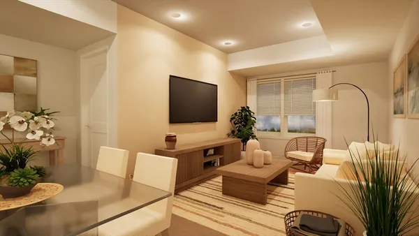 a living room with furniture and a flat screen tv