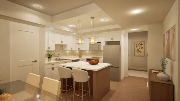 a kitchen with a sink and refrigerator