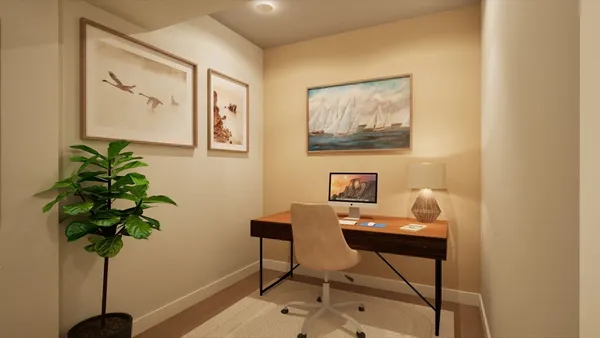 a view of a workspace with furniture