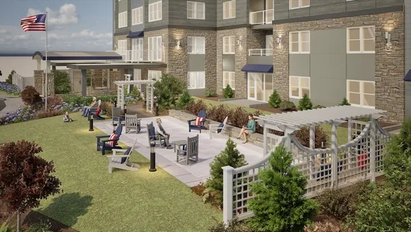 a view of a patio with couches table and chairs and potted plants