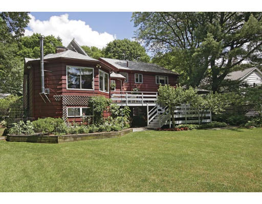 165 Paulson Road Newton, MA 02468 - Photo 5 of 7 a front view of a house with a garden