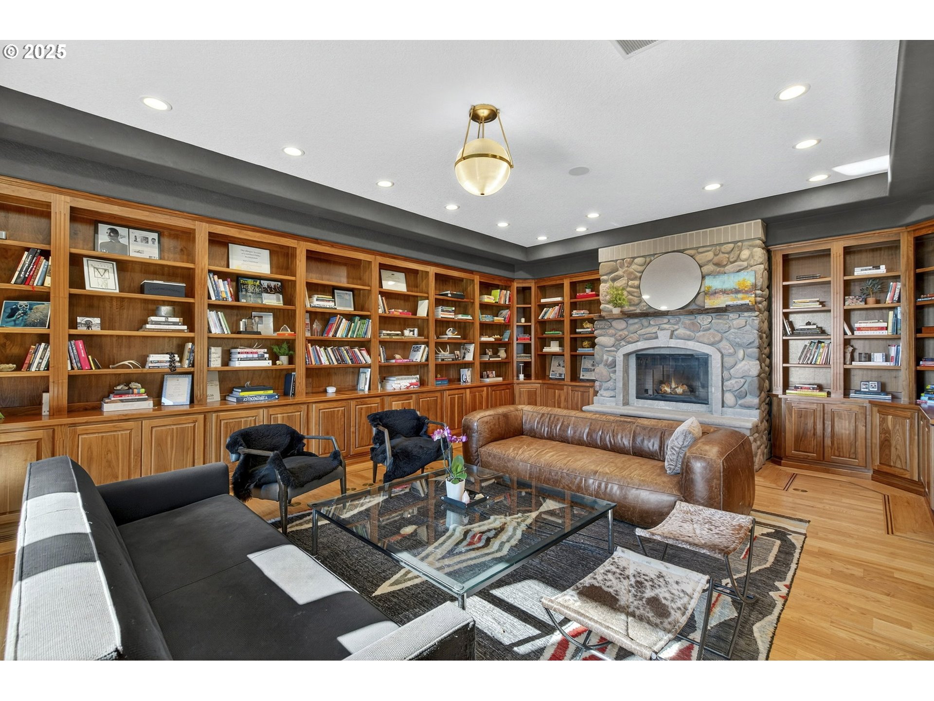 32520 Northeast Corral Creek Road Newberg, OR 97132 - Photo 16 of 48 a living room with furniture and a fireplace