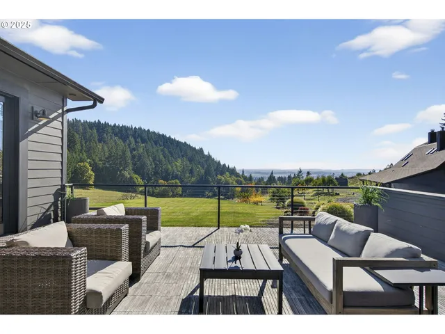a view of swimming pool with a table and chairs