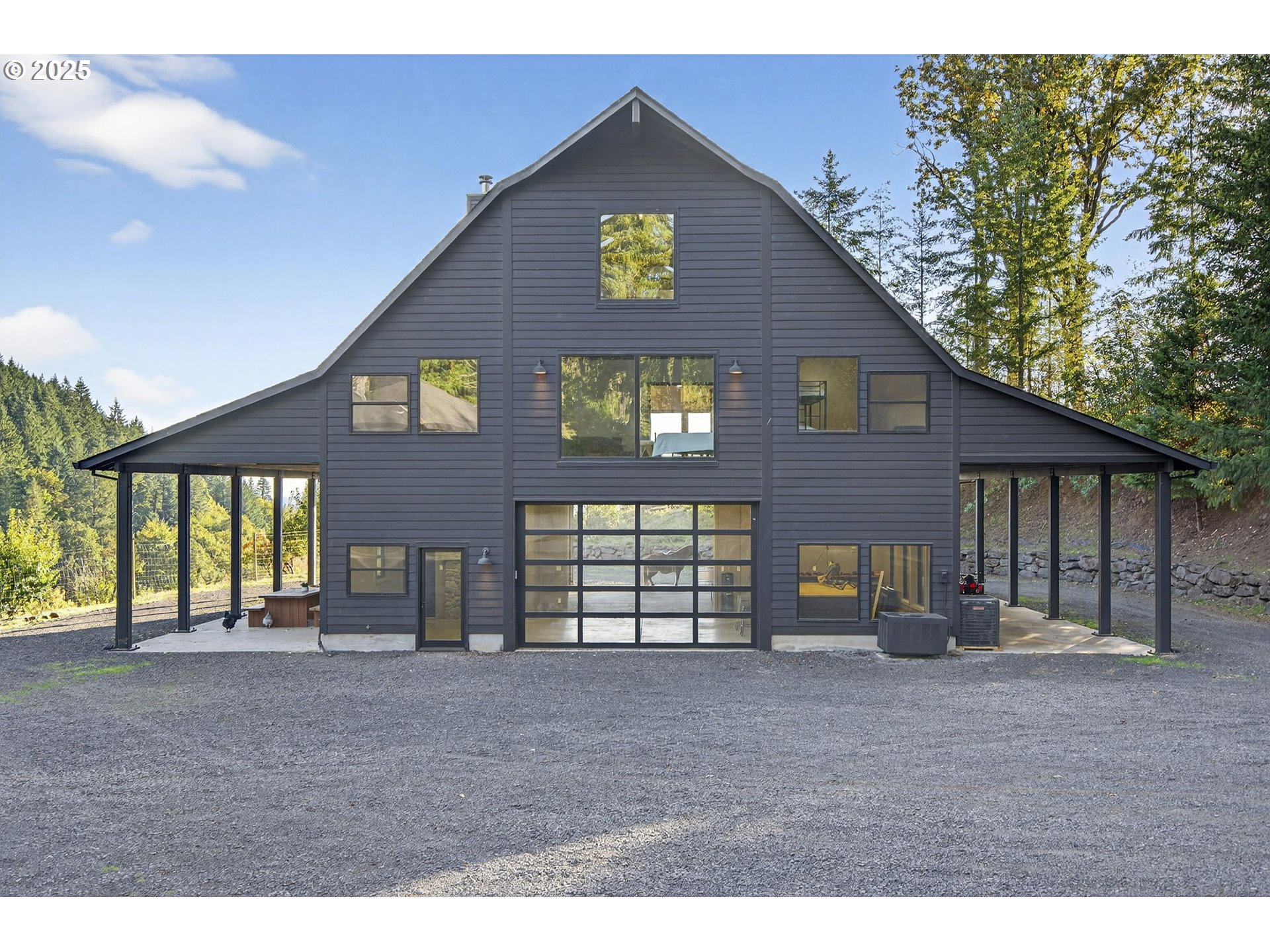 32520 Northeast Corral Creek Road Newberg, OR 97132 - Photo 37 of 48 a view of an house with backyard space and deck