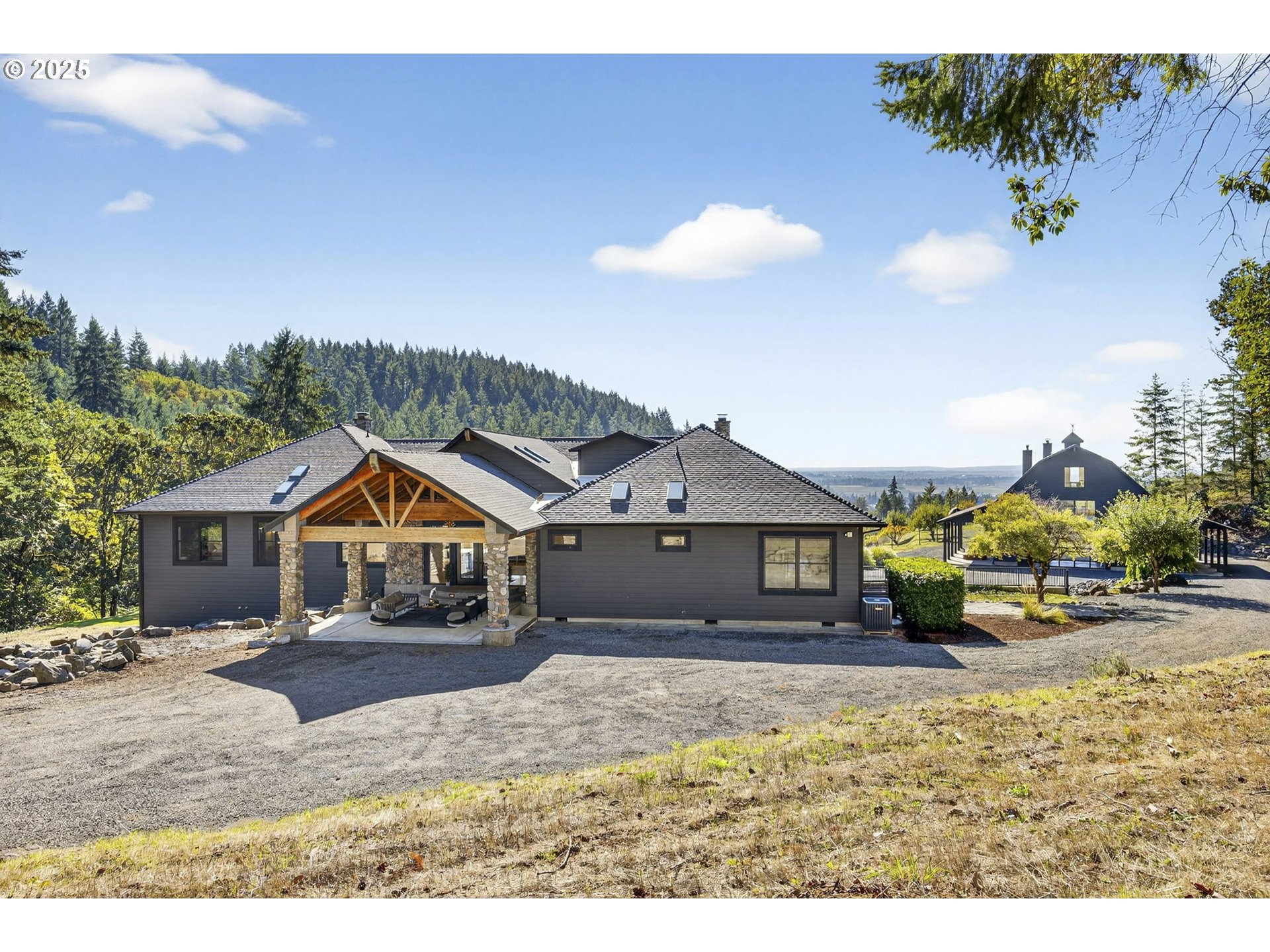 32520 Northeast Corral Creek Road Newberg, OR 97132 - Photo 4 of 48 a front view of a house with a garden and pathway