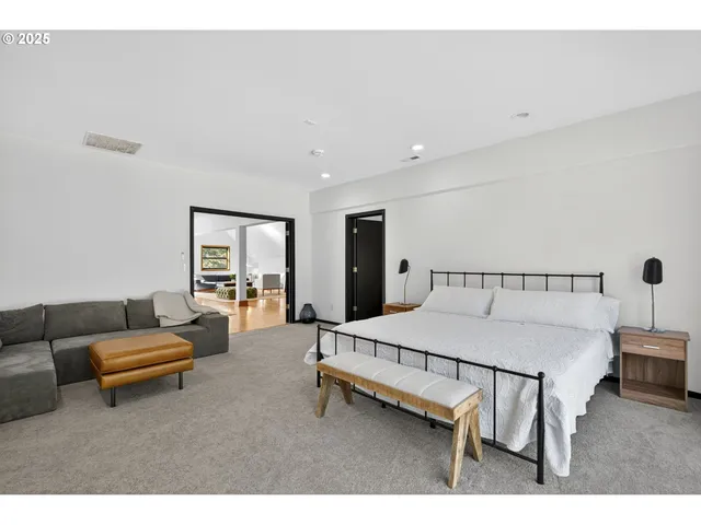 a bedroom with furniture and a couch