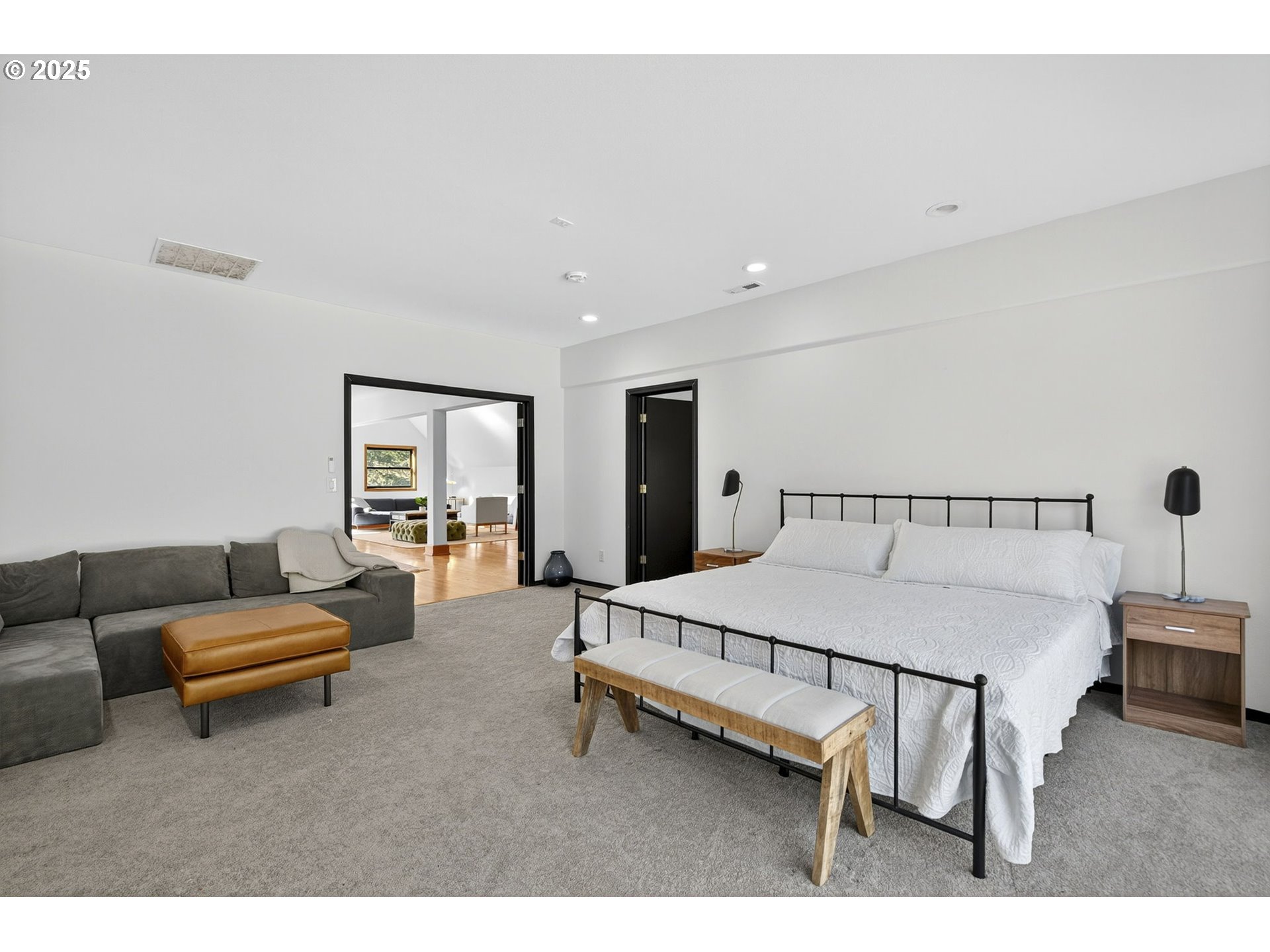 32520 Northeast Corral Creek Road Newberg, OR 97132 - Photo 41 of 48 a bedroom with furniture and a couch