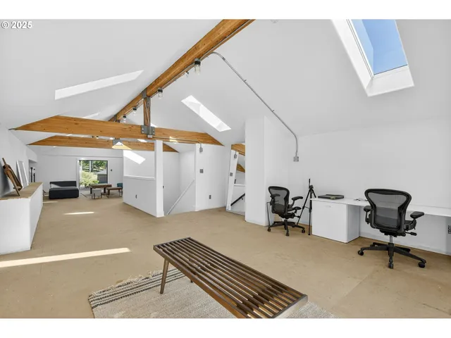 a room with gym equipment and a table