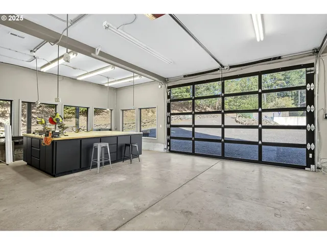 a view of an empty room with furniture