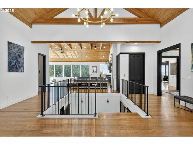 a view of a furniture window and wooden floor