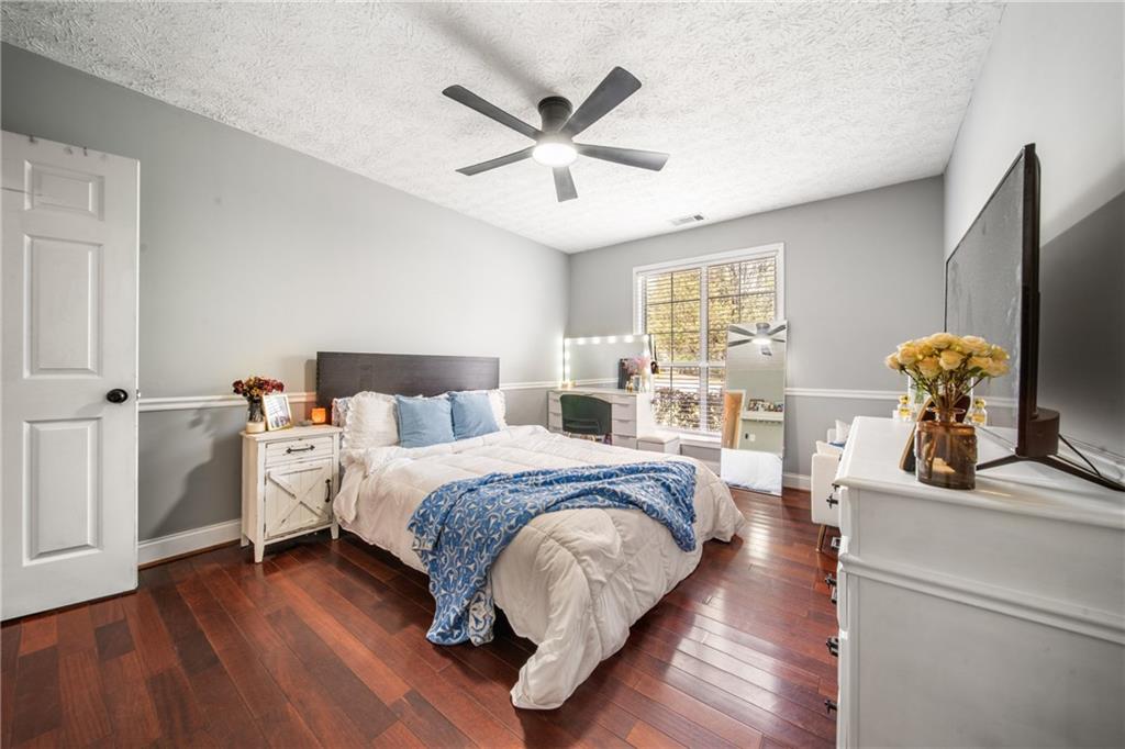 174 Foxtail Pass Acworth, GA 30101 - Photo 31 of 38 a bed room with a bed and a window