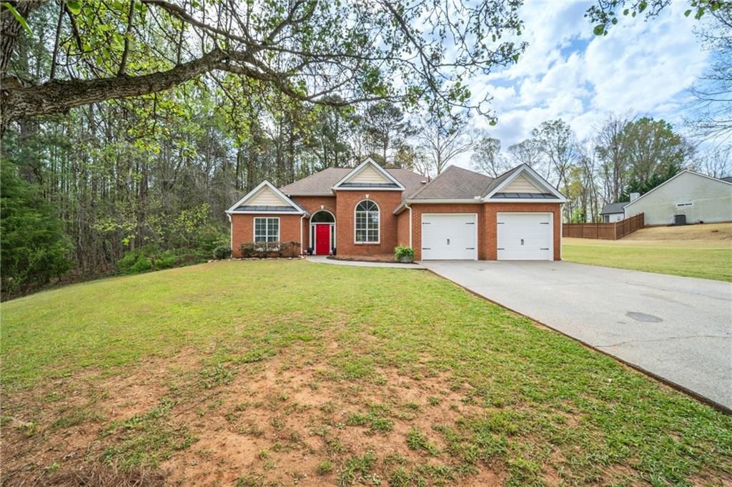 174 Foxtail Pass Acworth, GA 30101 - Photo 38 of 38 a house with huge green field in front of it