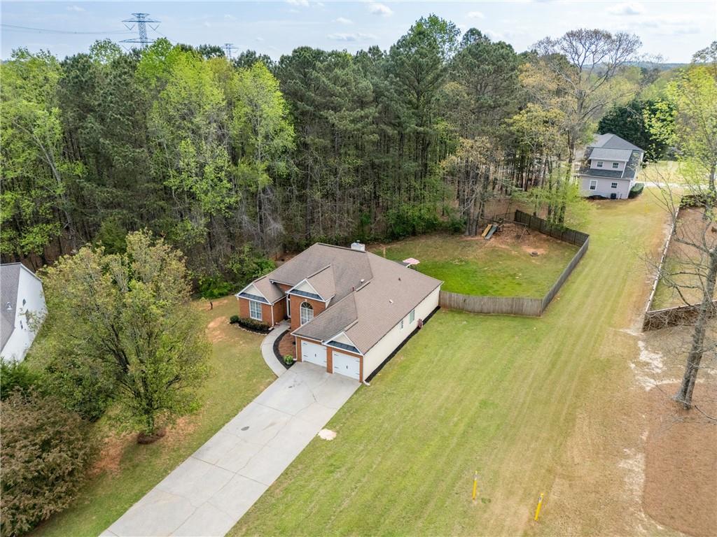 174 Foxtail Pass Acworth, GA 30101 - Photo 4 of 38 a view of a swimming pool with a patio