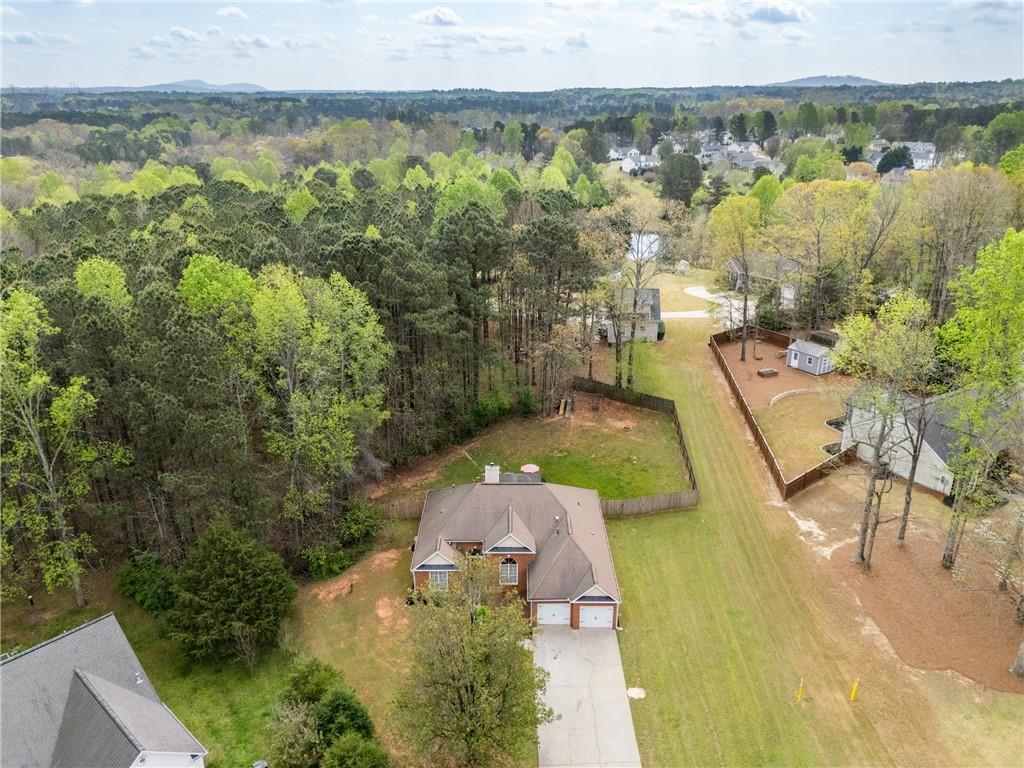 174 Foxtail Pass Acworth, GA 30101 - Photo 6 of 38 an aerial view of residential houses with outdoor space