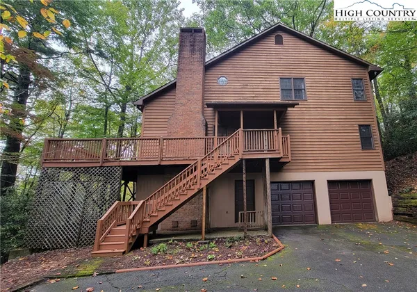 a house view with a backyard space